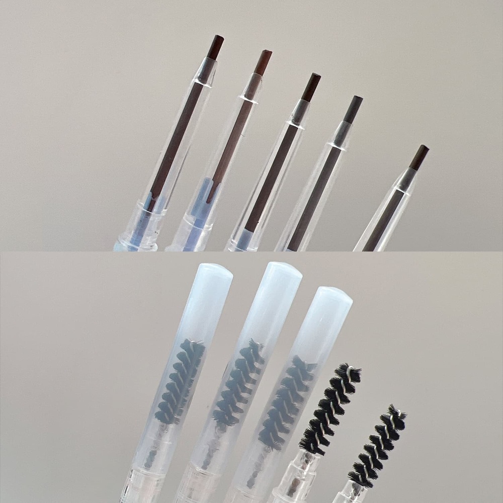 Double-ended eyebrow pencils with fine tips and spoolie brushes for natural brow definition
